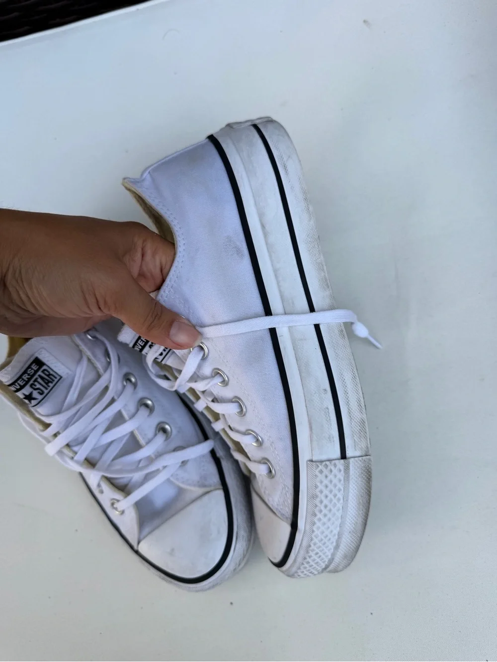 Converse women’s platform White Low Top Sneakers